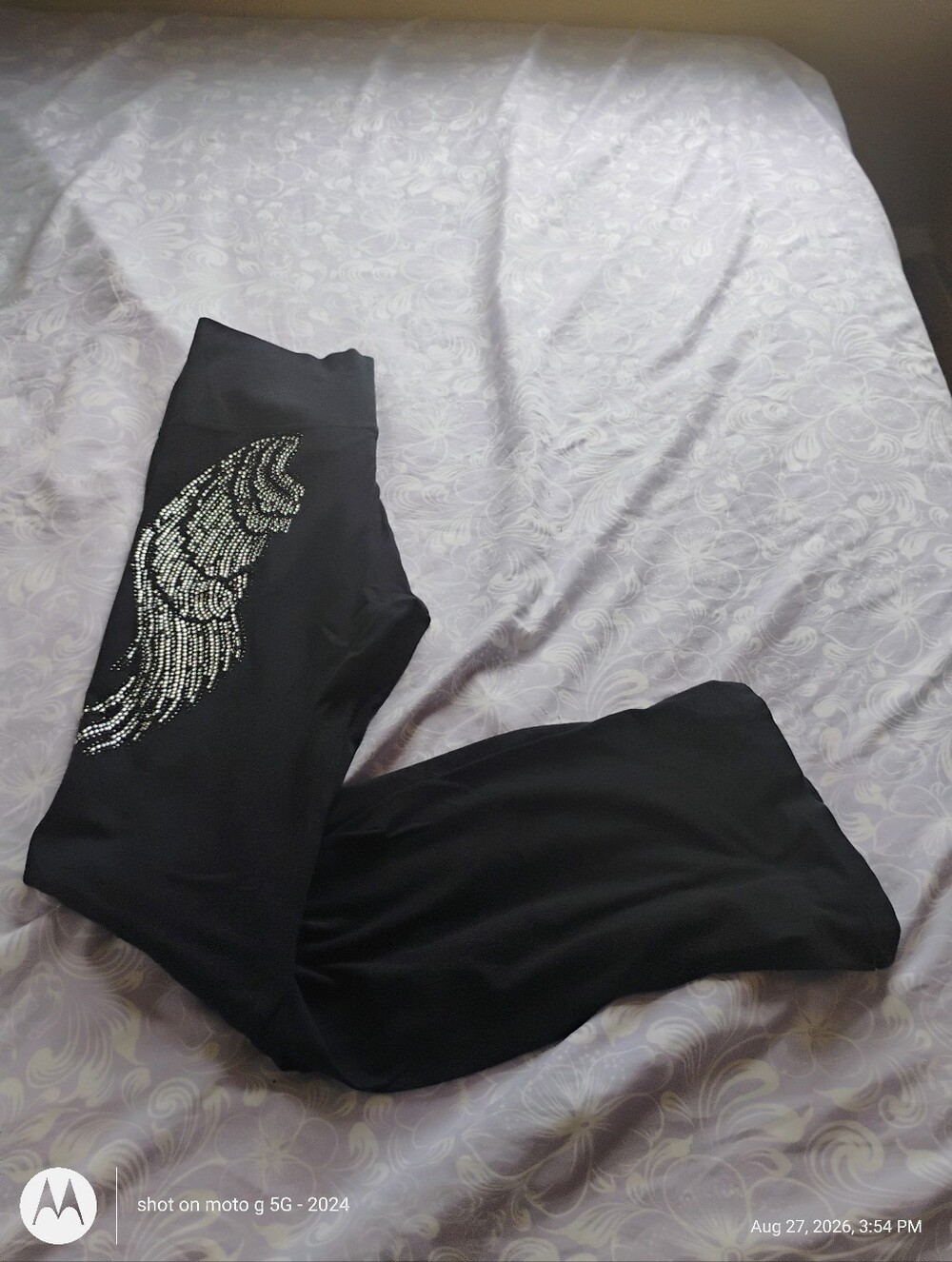 Romeo & Juliet Couture Black Leggings with Silver Rhinestone Wing